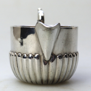 A small antique Victorian English sterling solid silver Cream Jug for one C.1886