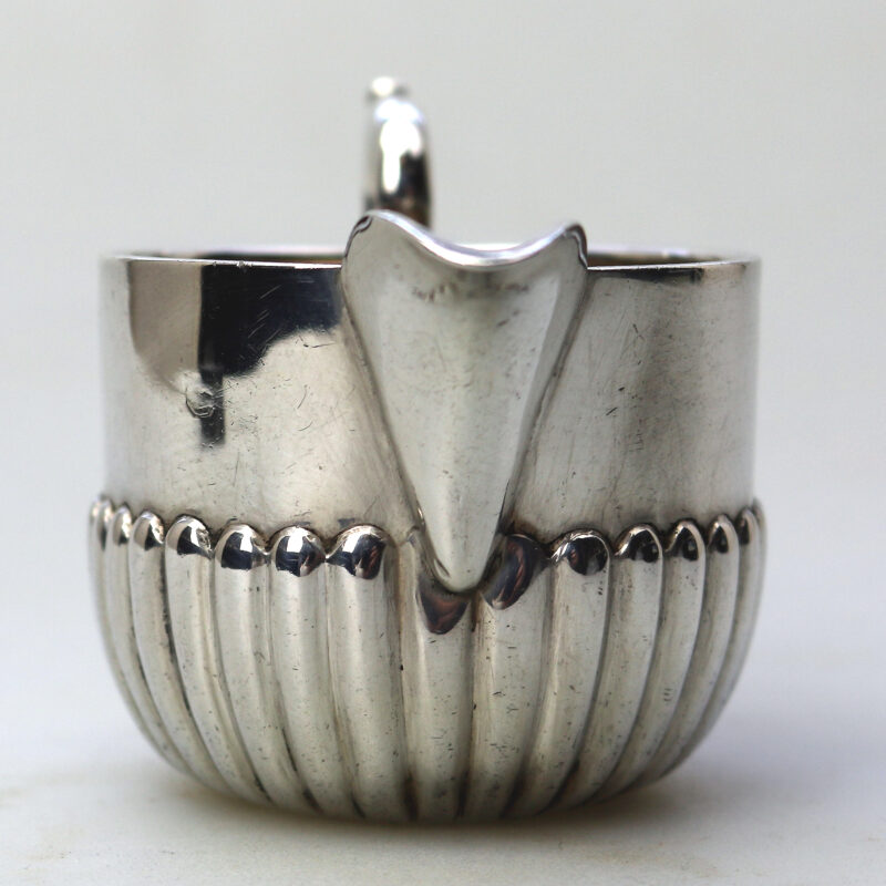 A small antique Victorian English sterling solid silver Cream Jug for one C.1886