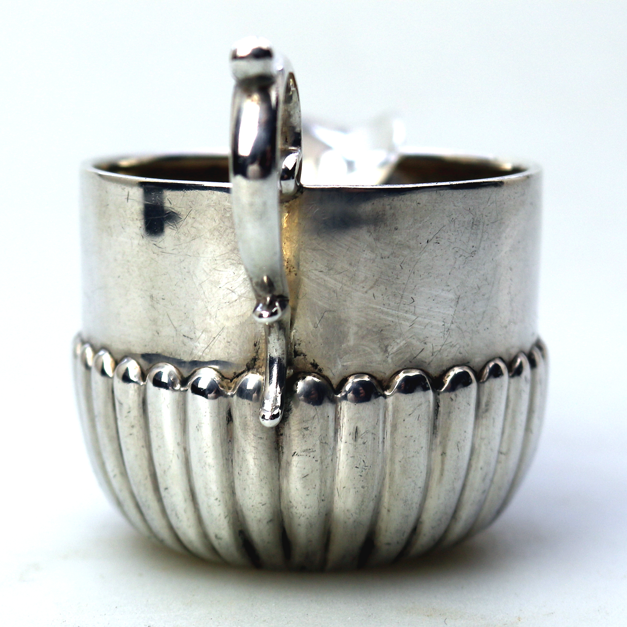 A small antique Victorian English sterling solid silver Cream Jug for one C.1886