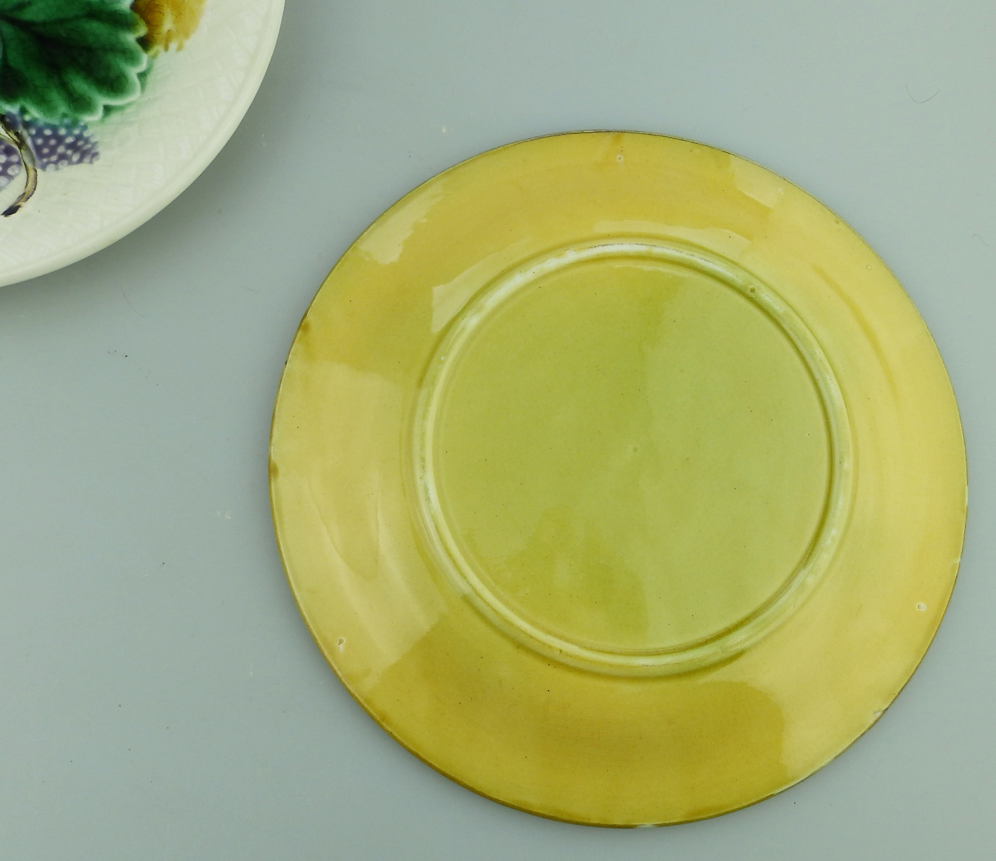 A pretty pair 2X antique Victorian majolica pottery grape & leaf Plates C.19thC