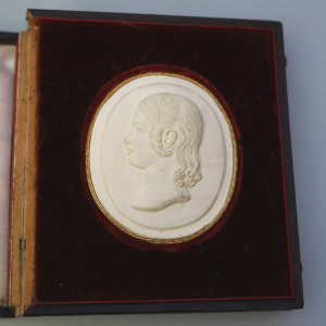 A rare antique Plaster bas-relief Portrait Silhouette Miniature of a girl C.1820