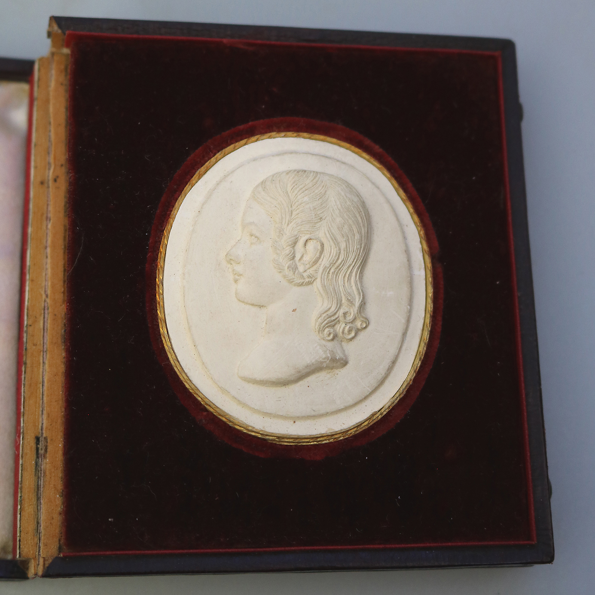 A rare antique Plaster bas-relief Portrait Silhouette Miniature of a girl C.1820