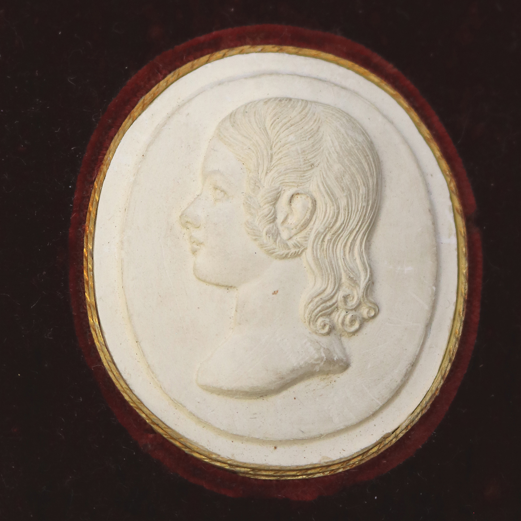 A rare antique Plaster bas-relief Portrait Silhouette Miniature of a girl C.1820