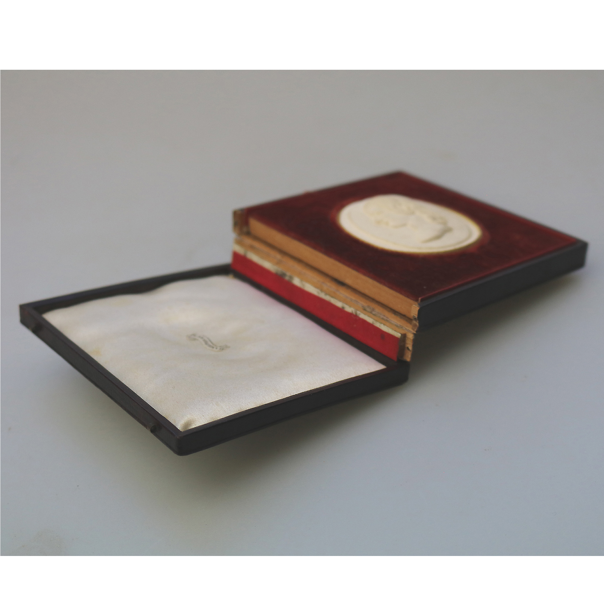 A rare antique Plaster bas-relief Portrait Silhouette Miniature of a girl C.1820
