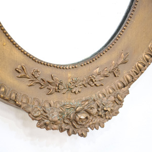 Pair of Oval Mirrors in Bronzed Ornate Wood Frames