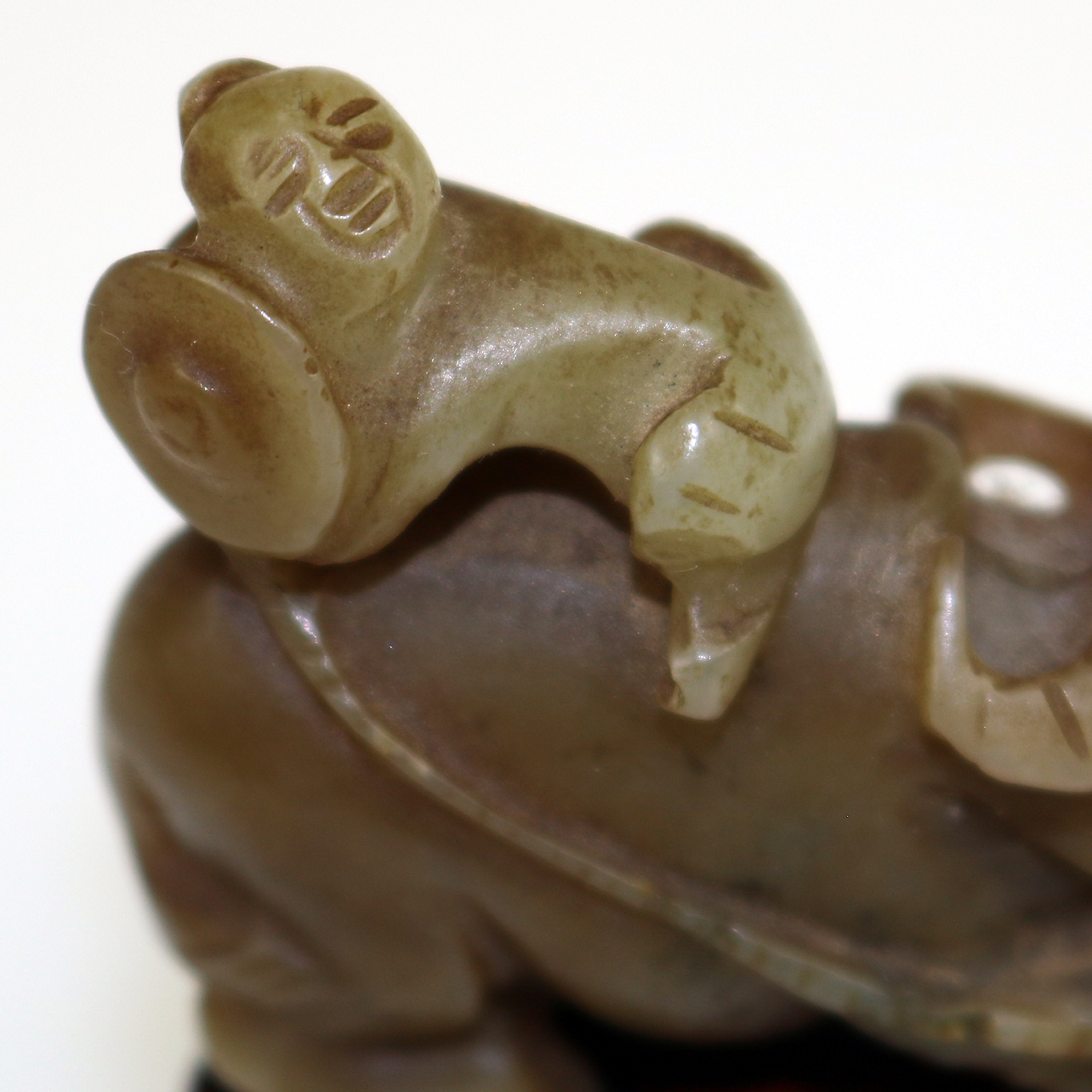 An antique miniature hand carved hardstone nephrite Figure on stand C.19th/20thC