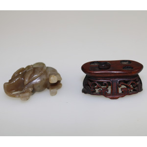 An antique miniature hand carved hardstone nephrite Figure on stand C.19th/20thC