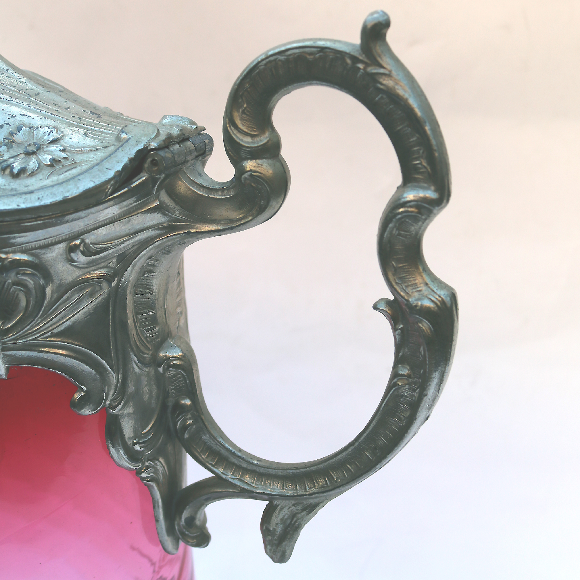 A substantial antique Art Nouveau cranberry glass wrythen Claret Jug C. pre 1900