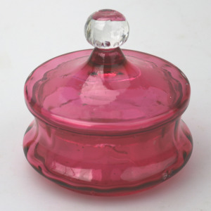 A pretty antique Victorian cranberry art glass lidded Bowl 11cm dia C.19thC