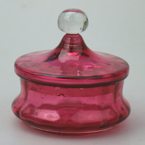 A pretty antique Victorian cranberry art glass lidded Bowl 11cm dia C.19thC