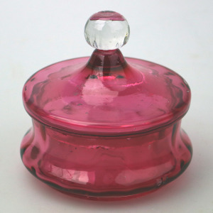 A pretty antique Victorian cranberry art glass lidded Bowl 11cm dia C.19thC