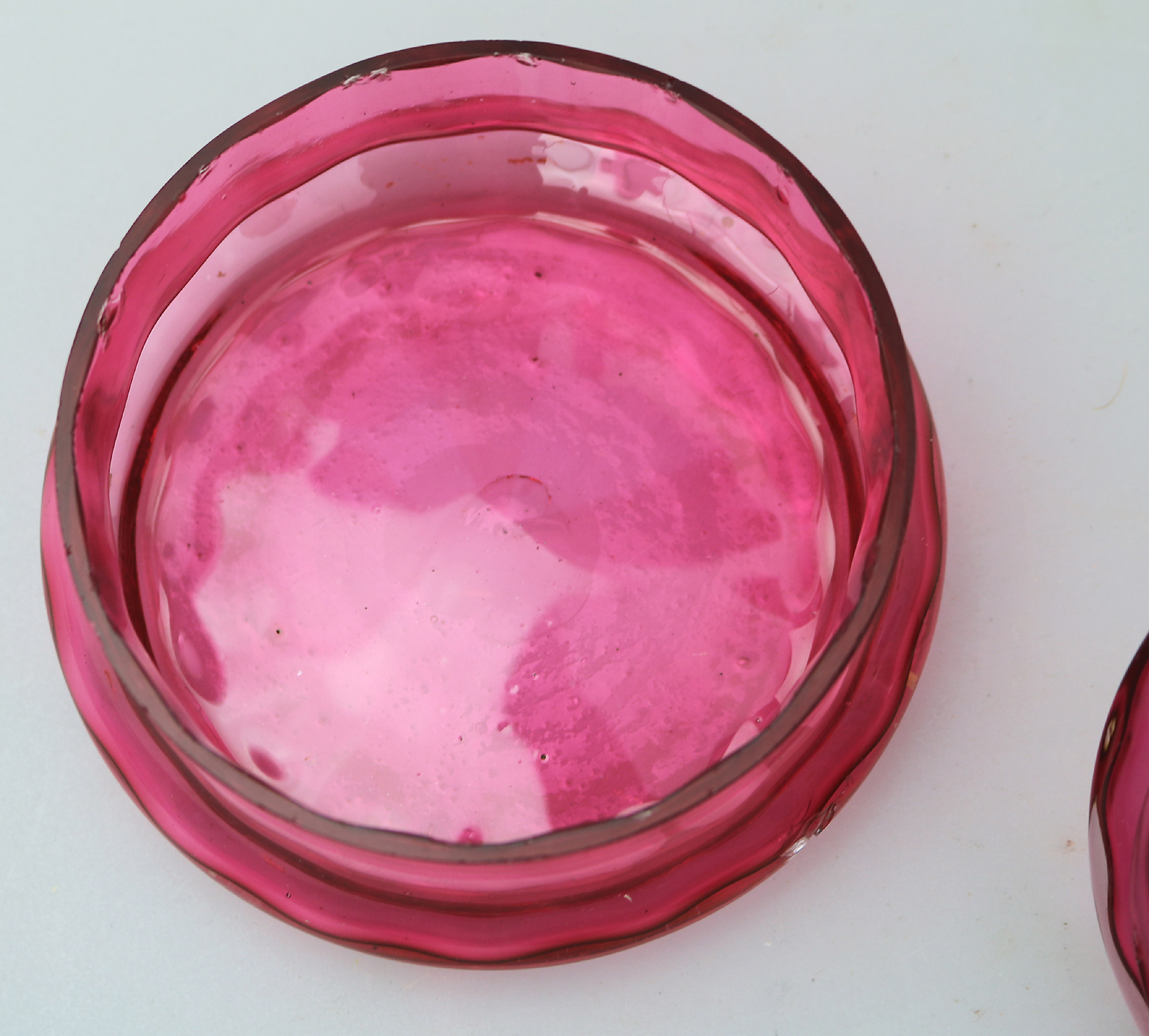 A pretty antique Victorian cranberry art glass lidded Bowl 11cm dia C.19thC