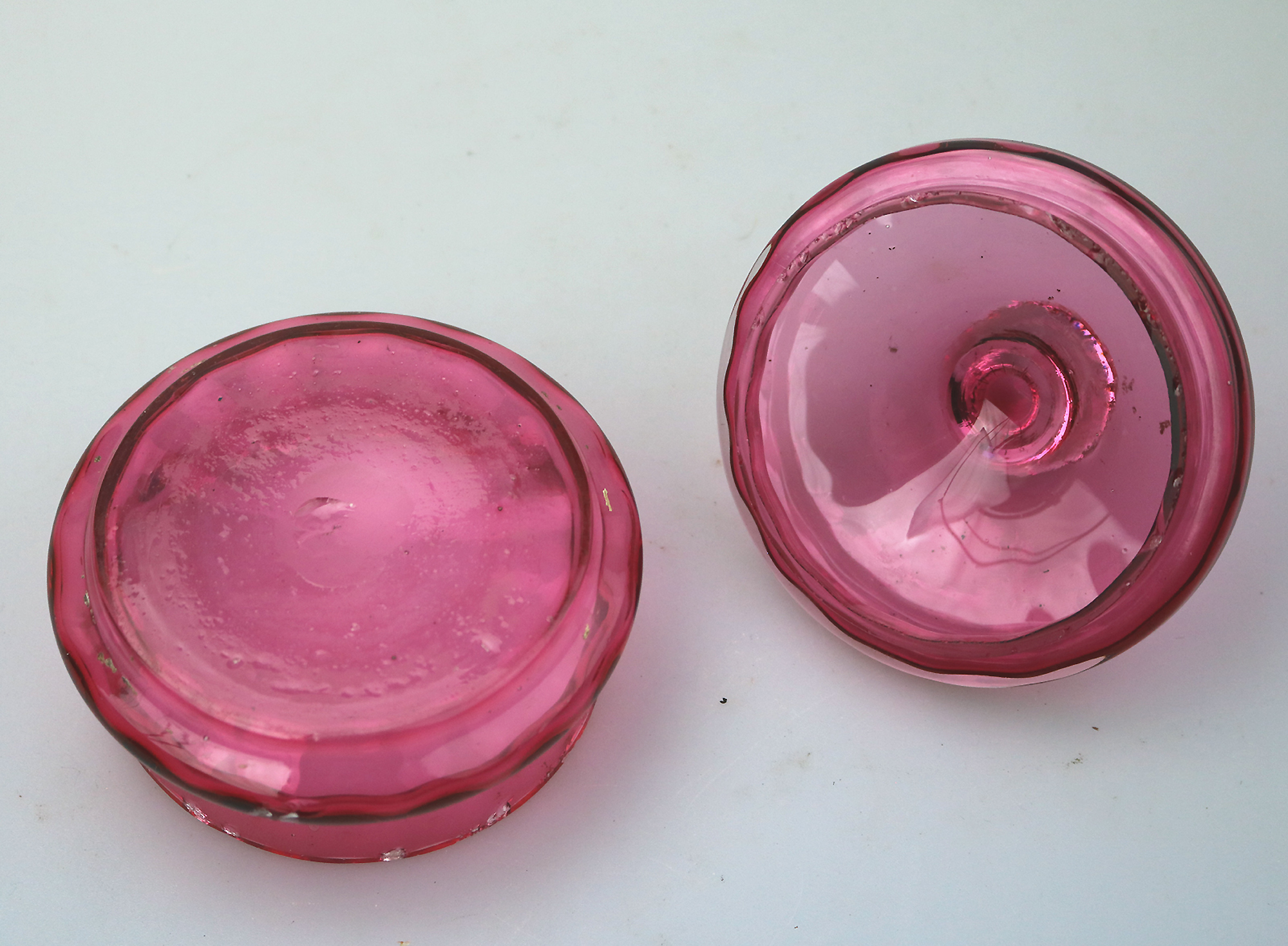 A pretty antique Victorian cranberry art glass lidded Bowl 11cm dia C.19thC