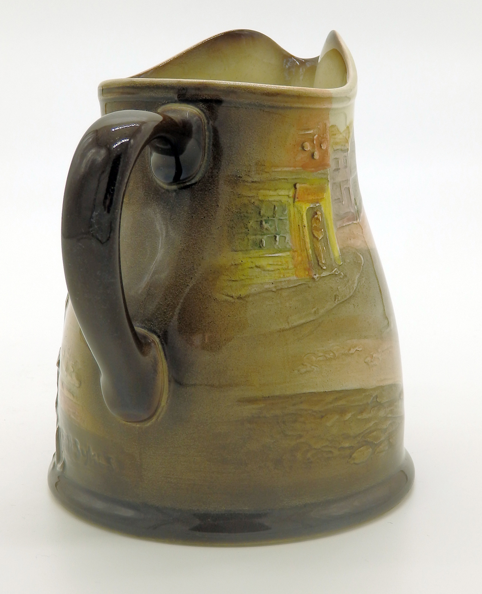 A scarce & good Royal Doulton relief pottery Series Dickensian Jug C.1930's