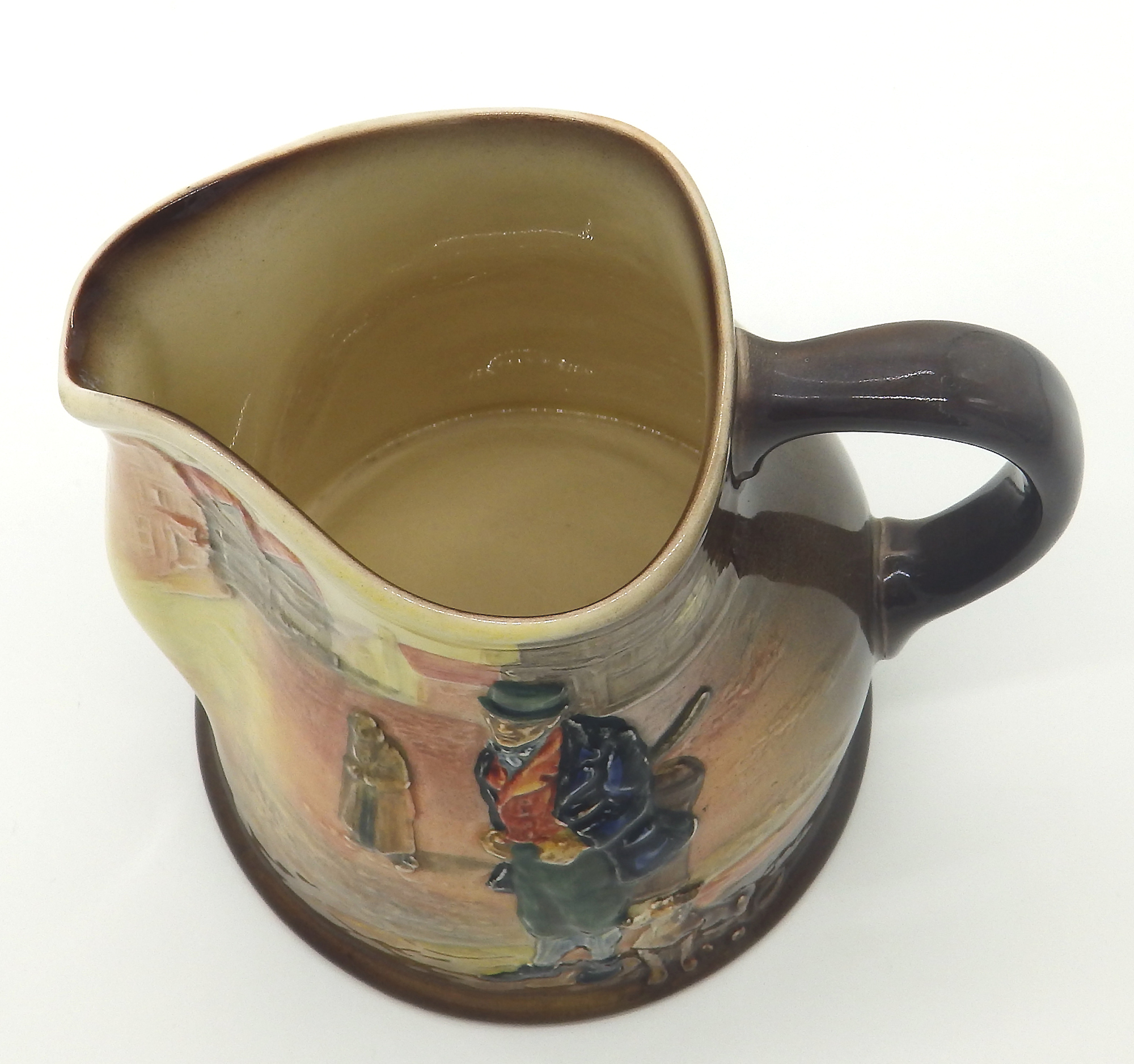 A scarce & good Royal Doulton relief pottery Series Dickensian Jug C.1930's