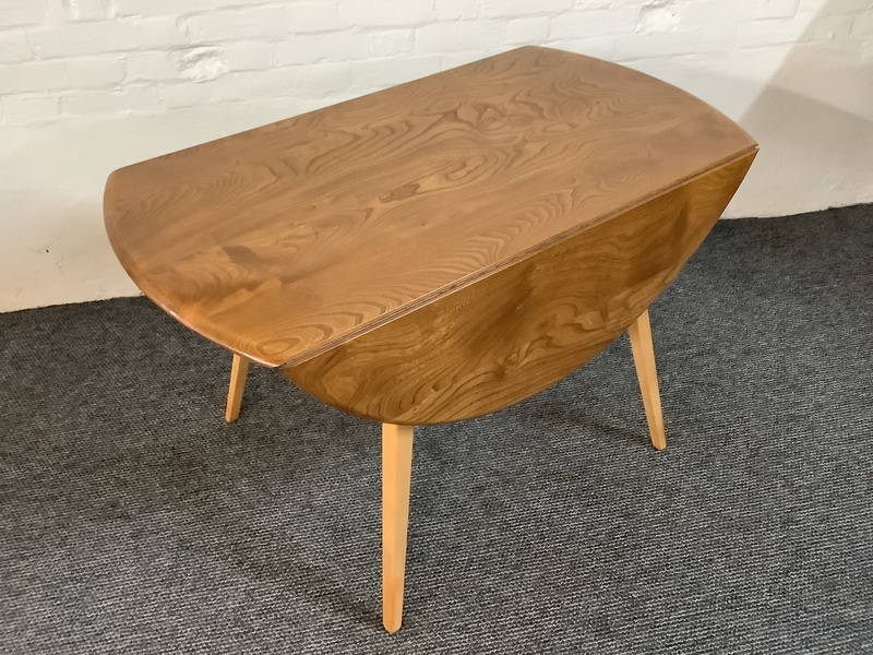 Ercol Windsor 384 Drop Leaf Dining Table In Original Natural Elm Finish.