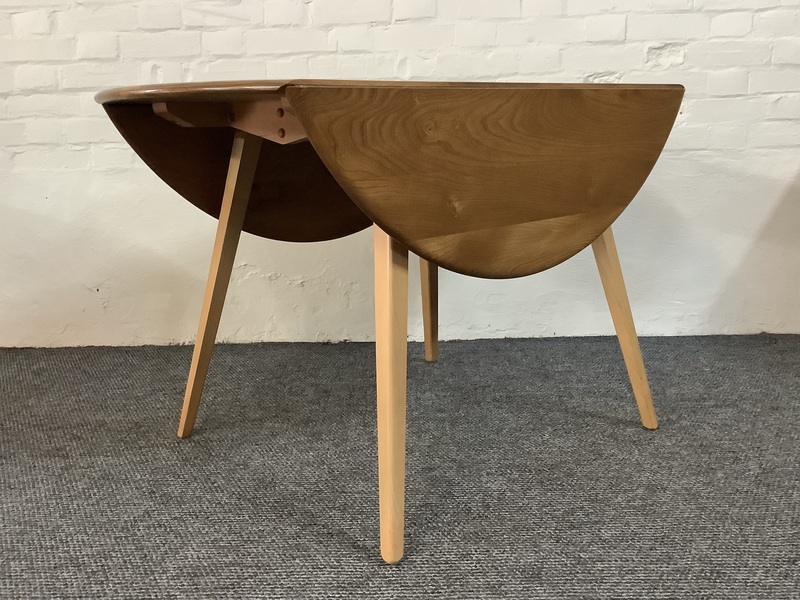 Ercol Windsor 384 Drop Leaf Dining Table In Original Natural Elm Finish.