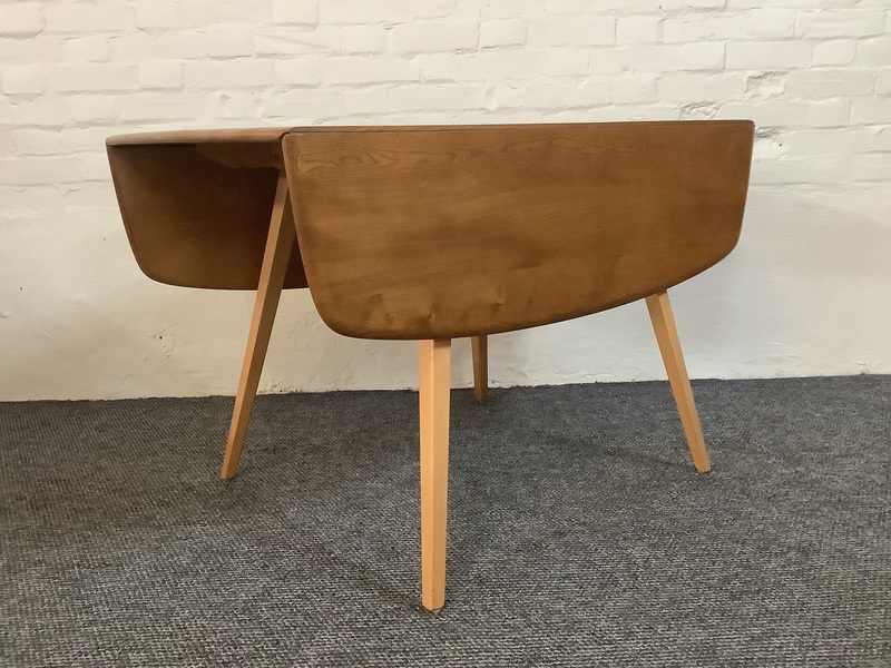 Ercol Windsor 492 Drop Leaf Dining Table In Natural Elm Finish.