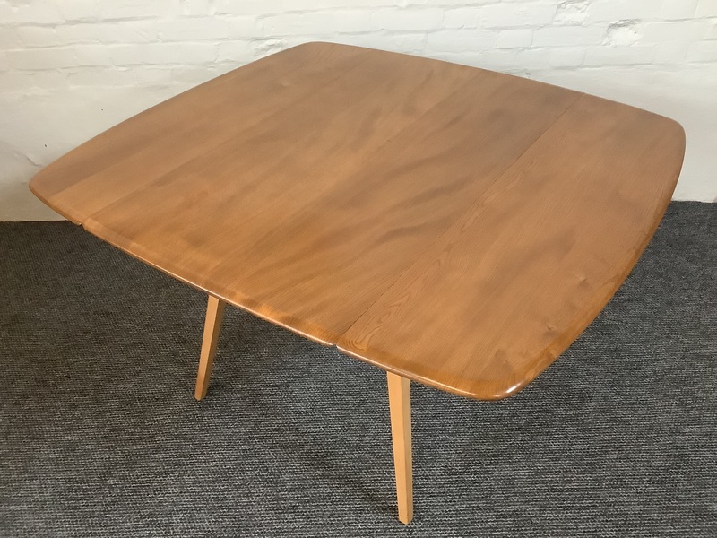 Ercol Windsor 492 Drop Leaf Dining Table In Natural Elm Finish.