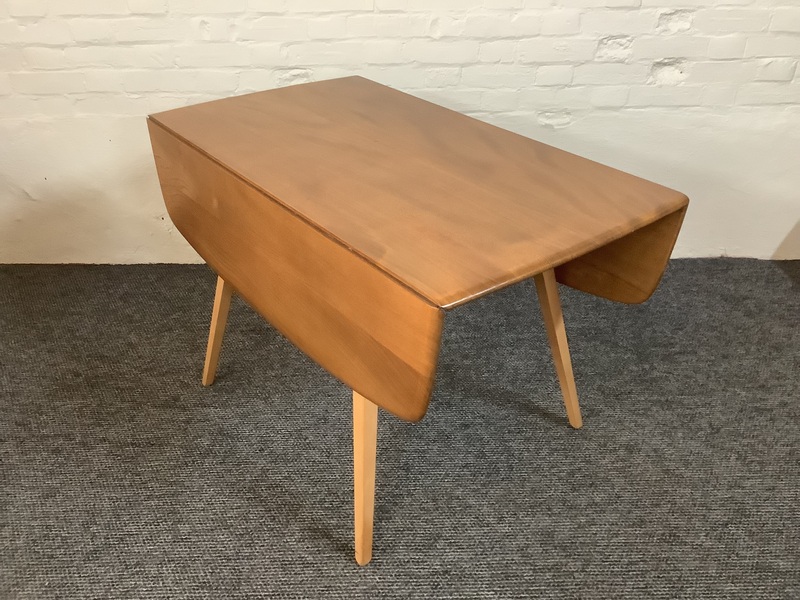 Ercol Windsor 492 Drop Leaf Dining Table In Natural Elm Finish.