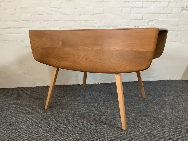 Ercol Windsor 492 Drop Leaf Dining Table In Natural Elm Finish.