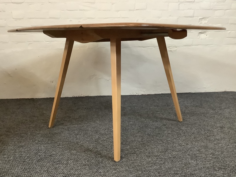 Ercol Windsor 492 Drop Leaf Dining Table In Natural Elm Finish.