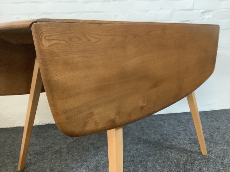 Ercol Windsor 492 Drop Leaf Dining Table In Natural Elm Finish.