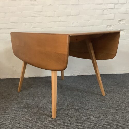 Ercol Windsor 492 Drop Leaf Dining Table In Natural Elm Finish.