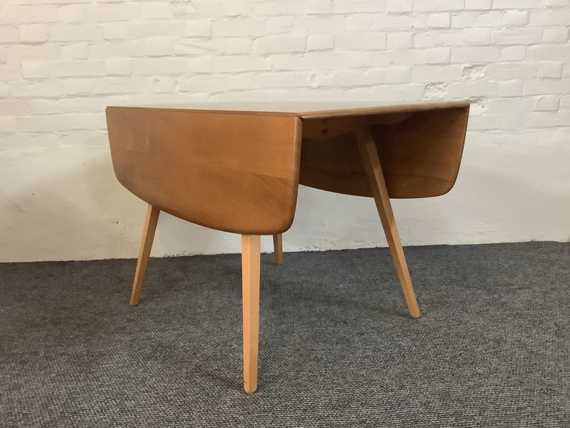 Ercol Windsor 492 Drop Leaf Dining Table In Natural Elm Finish.