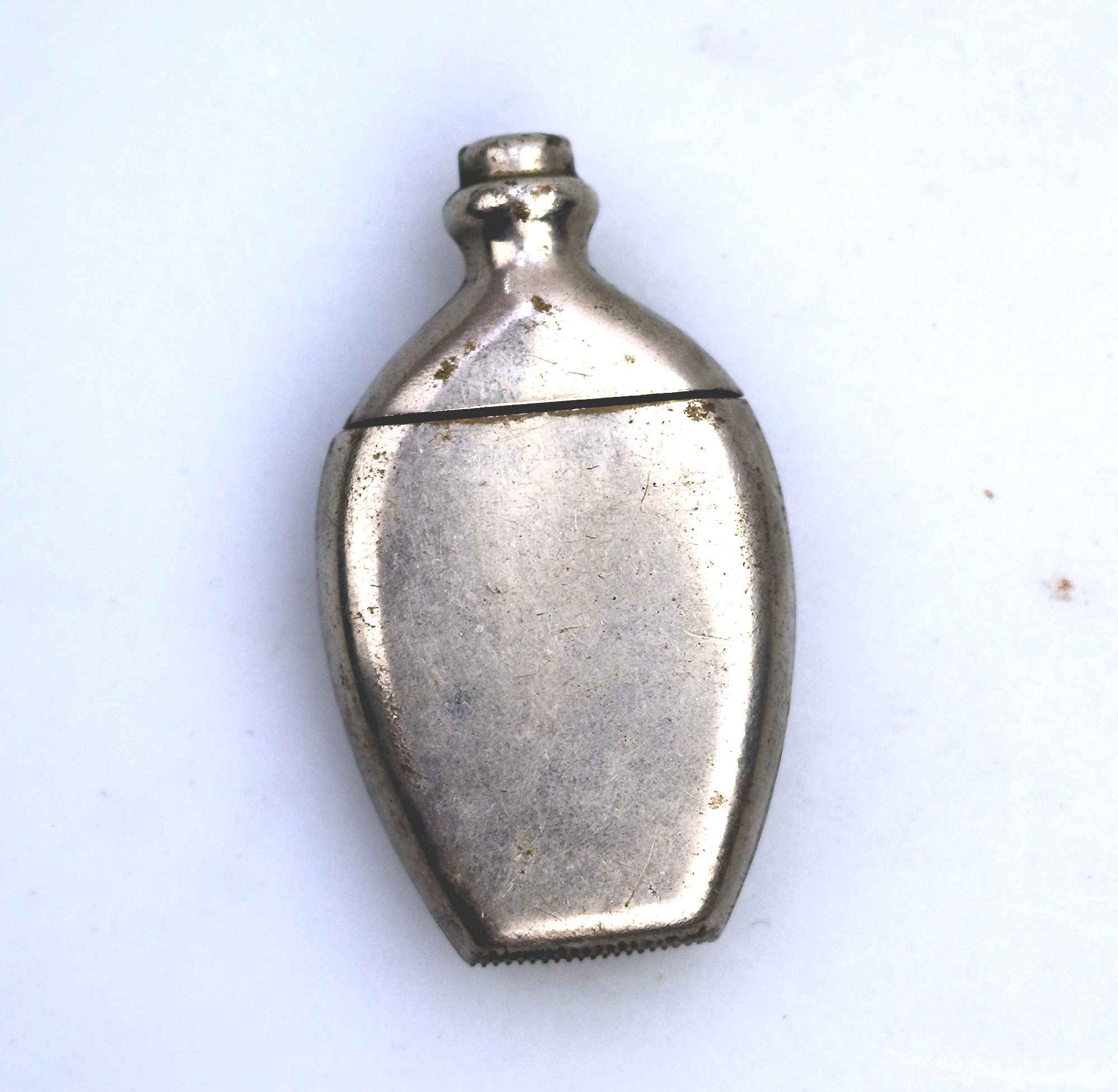 An antique novelty silver plate bottle shape Go to Bed Vesta Case C.19thC