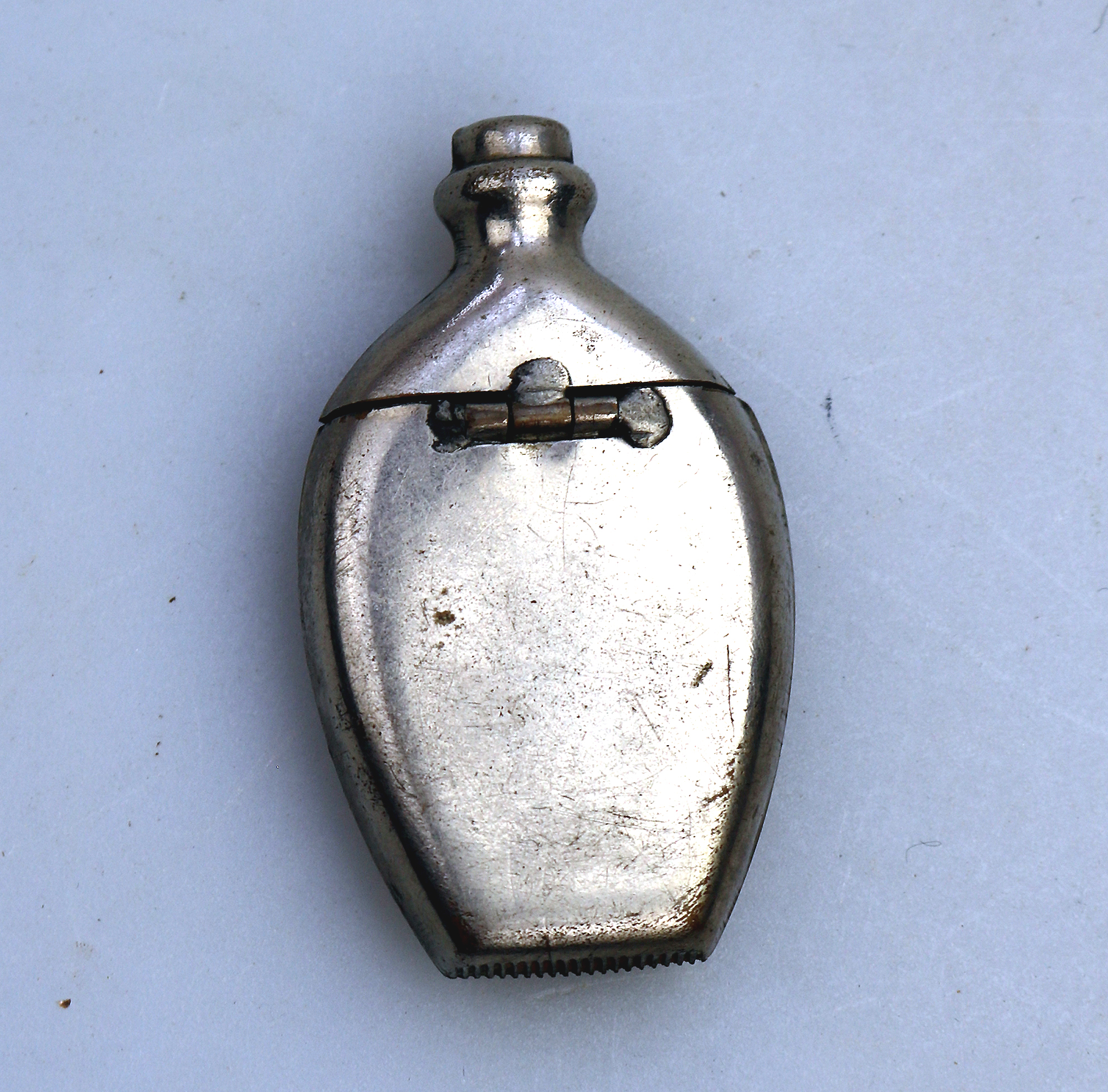 An antique novelty silver plate bottle shape Go to Bed Vesta Case C.19thC
