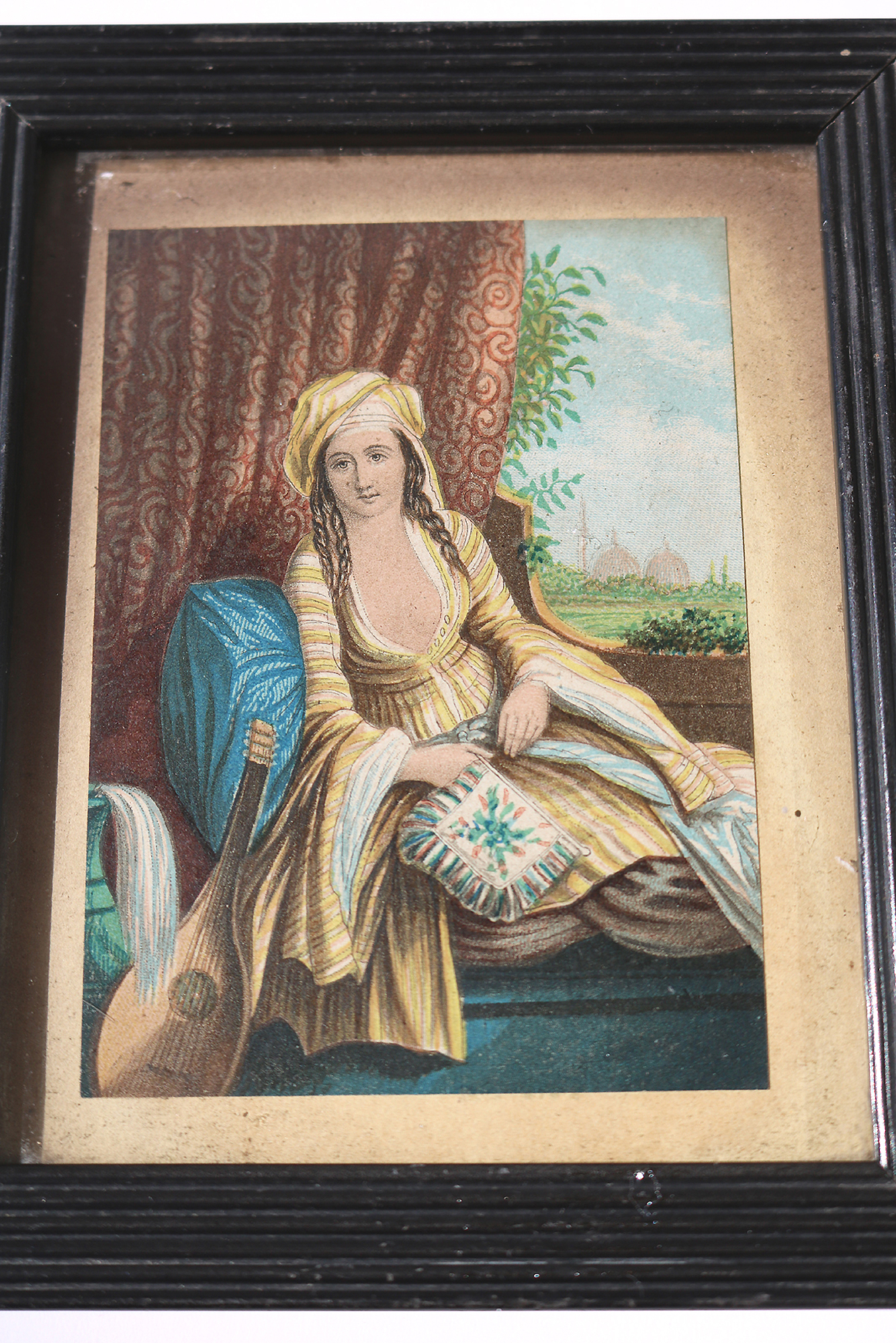 A charming antique polychrome Print Greek themed Musician & Bouzouki C.19thC