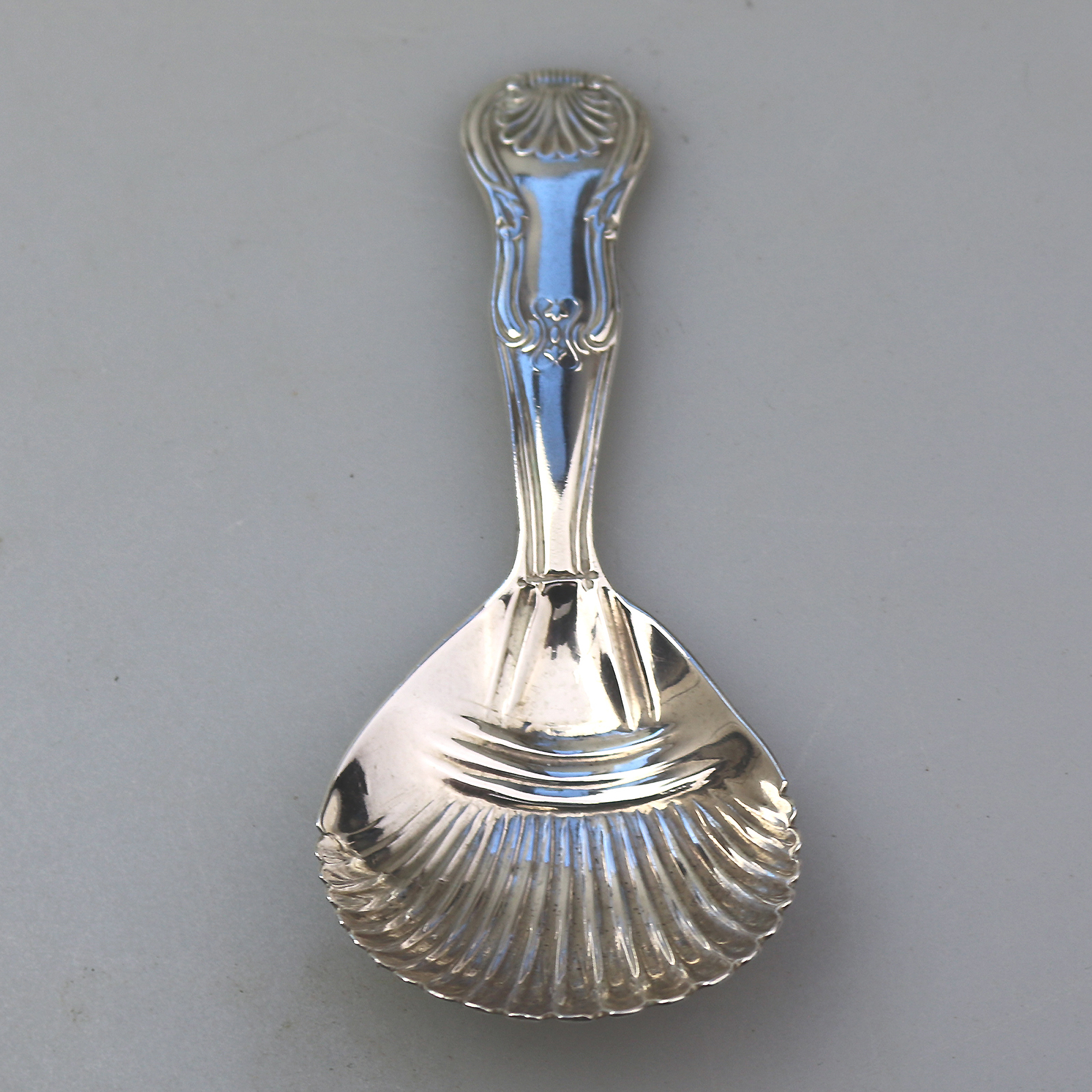 An antique Georgian Irish solid silver Kings handle Caddy Spoon Dublin C.1822