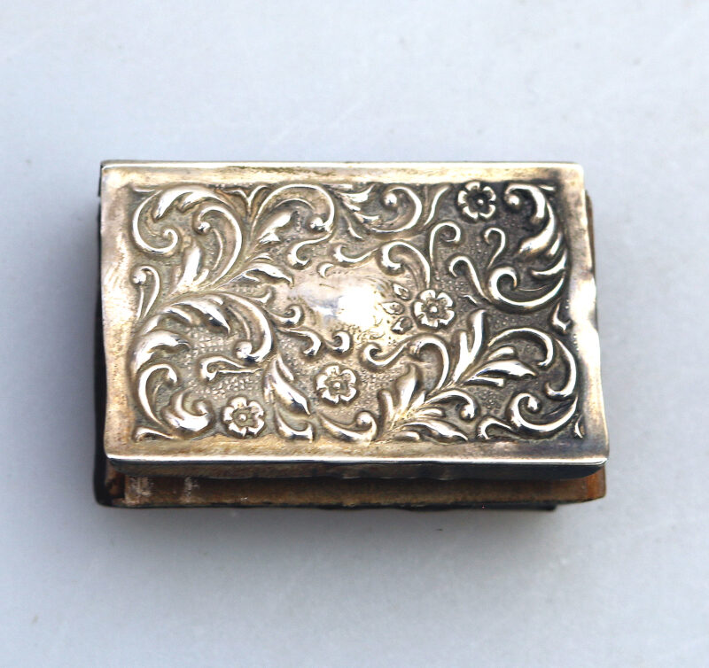 An antique Art Nouveau English solid silver repousse Matchbox Cover C.1904