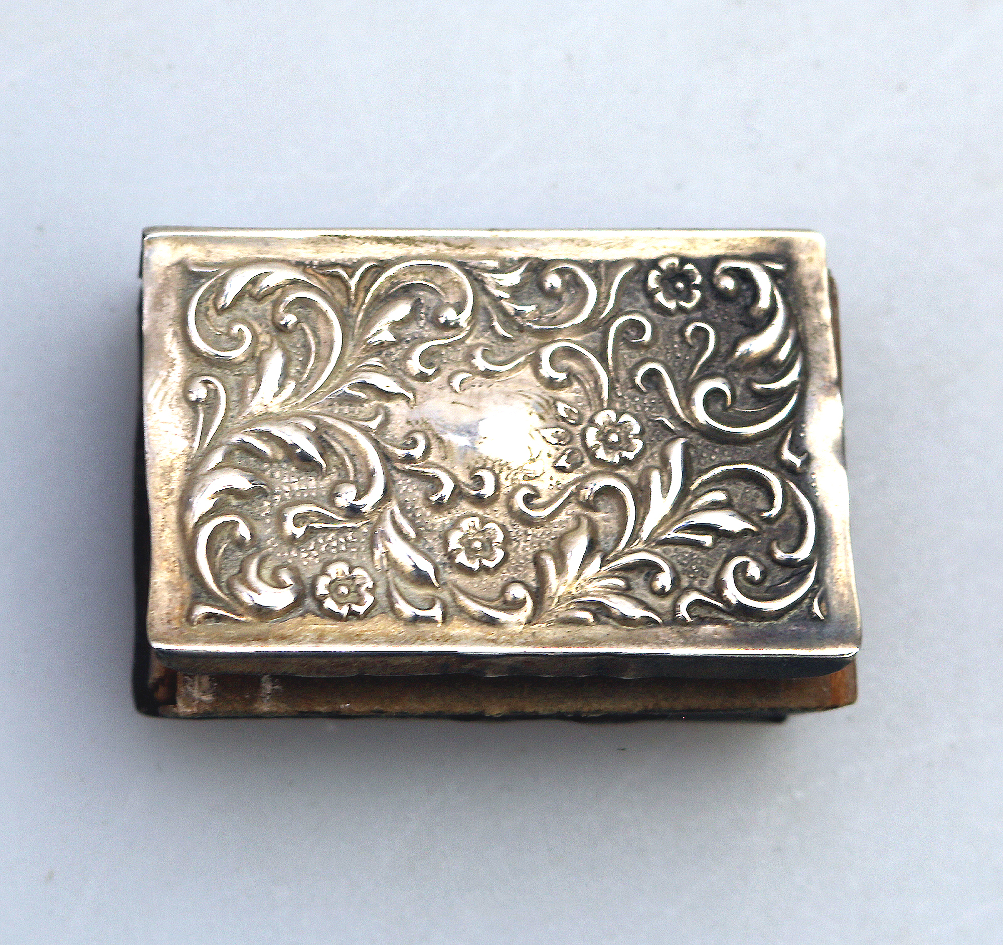 An antique Art Nouveau English solid silver repousse Matchbox Cover C.1904