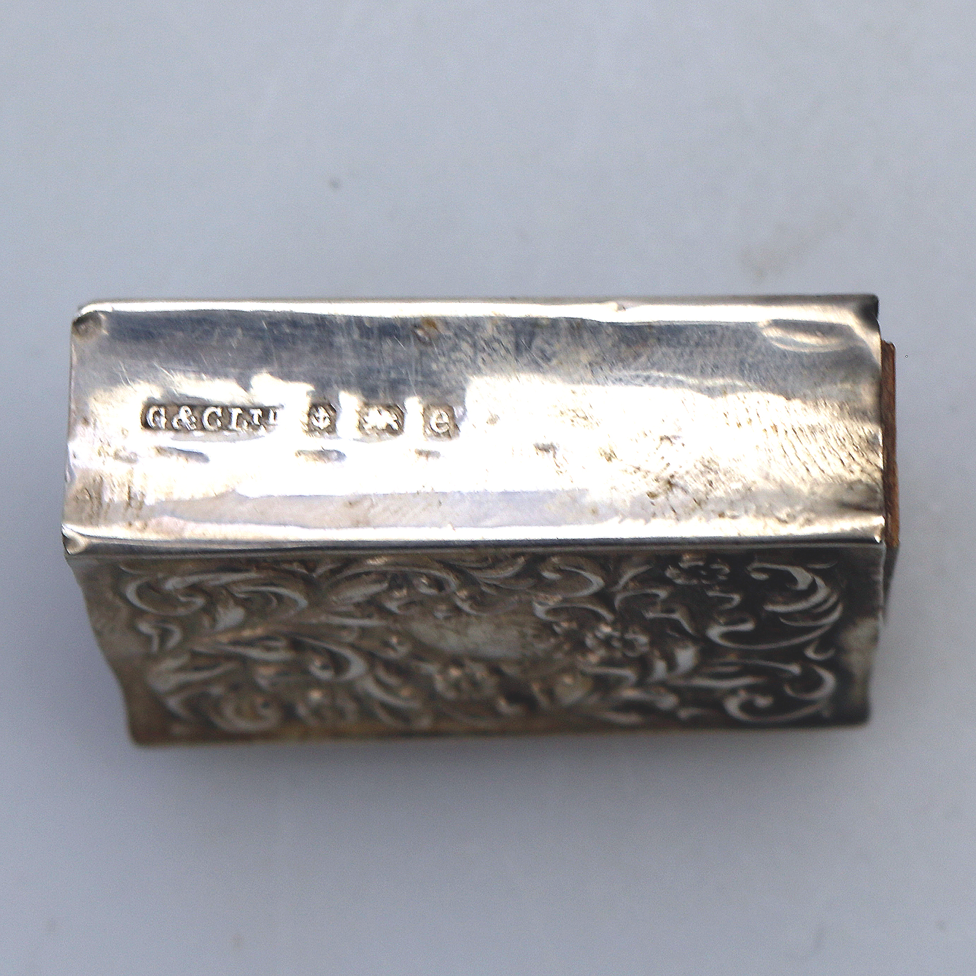 An antique Art Nouveau English solid silver repousse Matchbox Cover C.1904