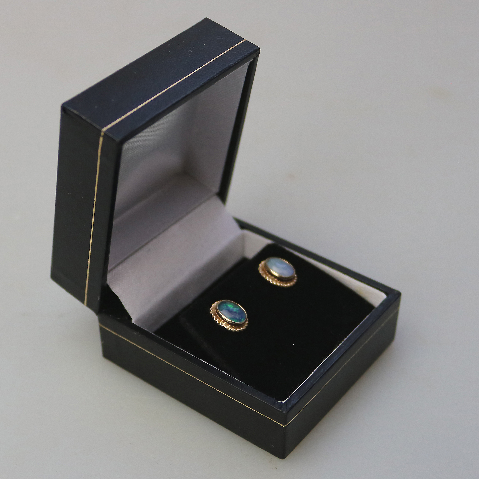 A pair of vintage 9ct gold and opal Earrings - boxed C.20thC