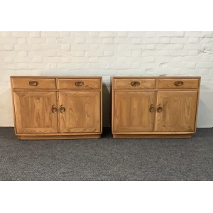 Pair Of Ercol Windsor Sideboard Cabinets In Light Finish.