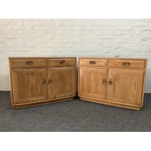 Pair Of Ercol Windsor Sideboard Cabinets In Light Finish.