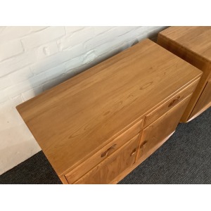 Pair Of Ercol Windsor Sideboard Cabinets In Light Finish.
