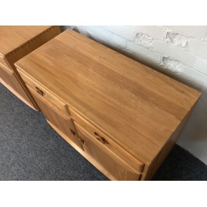 Pair Of Ercol Windsor Sideboard Cabinets In Light Finish.