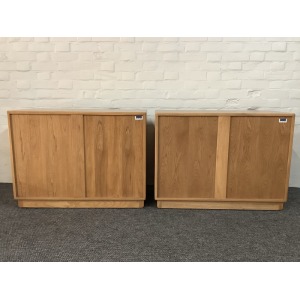 Pair Of Ercol Windsor Sideboard Cabinets In Light Finish.