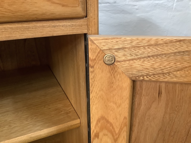 Pair Of Ercol Windsor Sideboard Cabinets In Light Finish.
