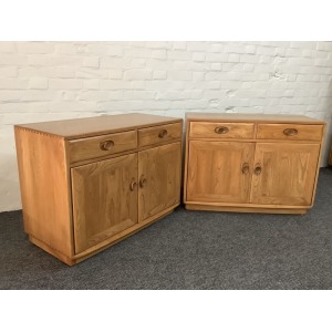 Pair Of Ercol Windsor Sideboard Cabinets In Light Finish.