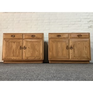 Pair Of Ercol Windsor Sideboard Cabinets In Light Finish.
