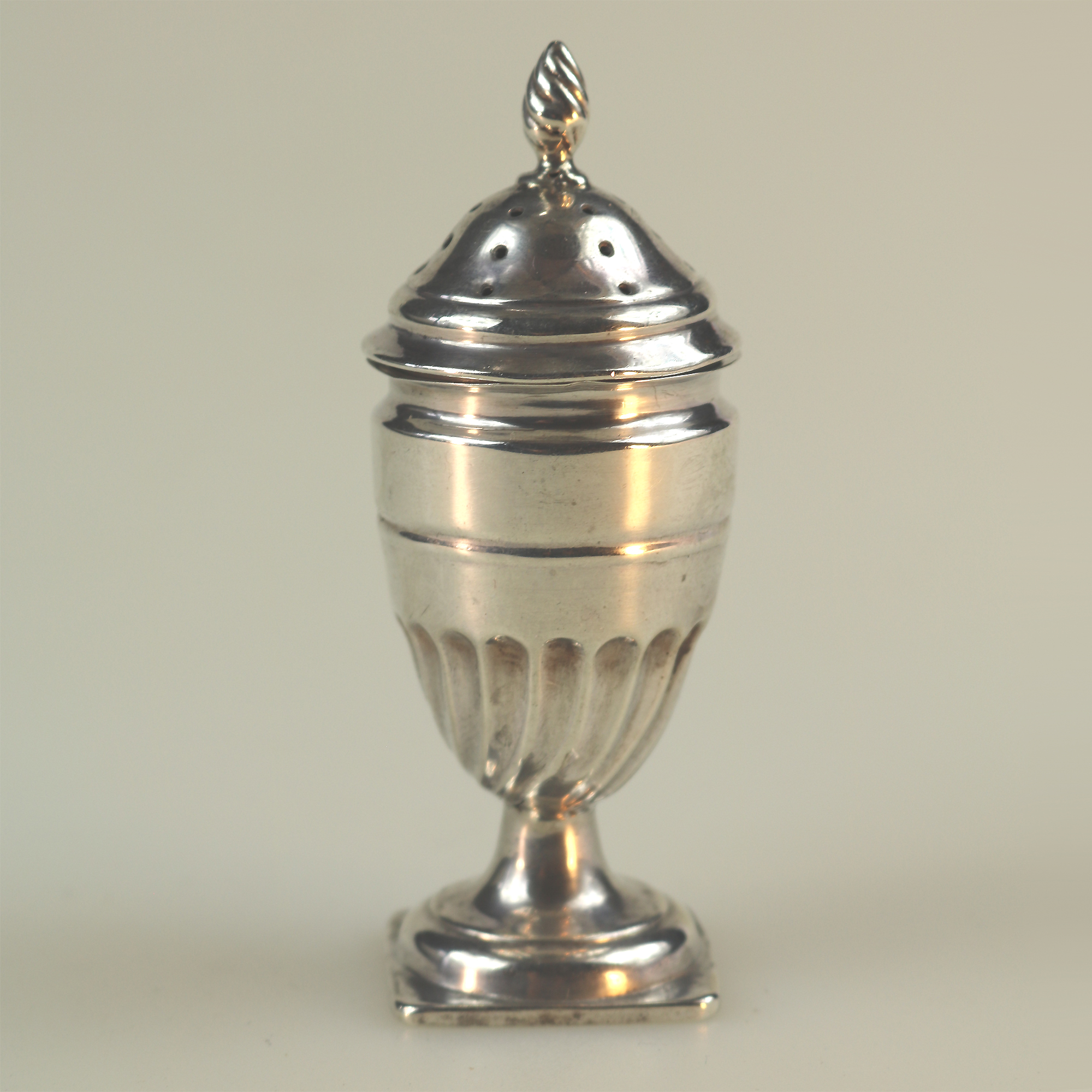 An antique Victorian English sterling solid silver pedestal Pepper Pot C.1896