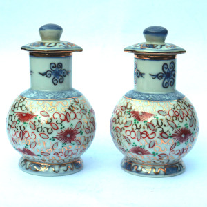 An unusual pair of porcelain Scent Perfume Bottle with screw caps C.20thC