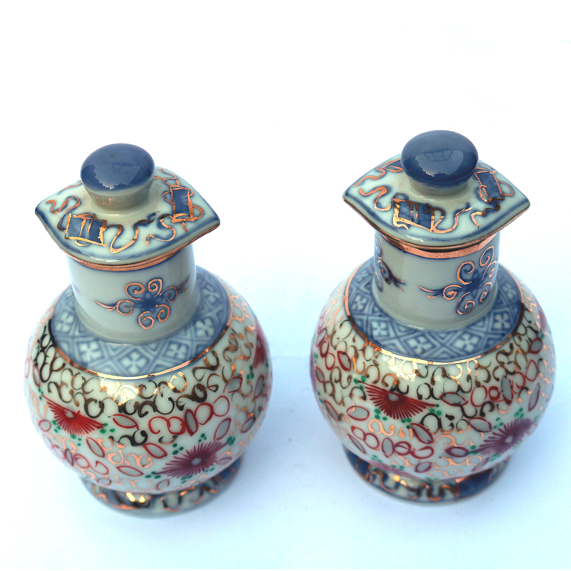 An unusual pair of porcelain Scent Perfume Bottle with screw caps C.20thC