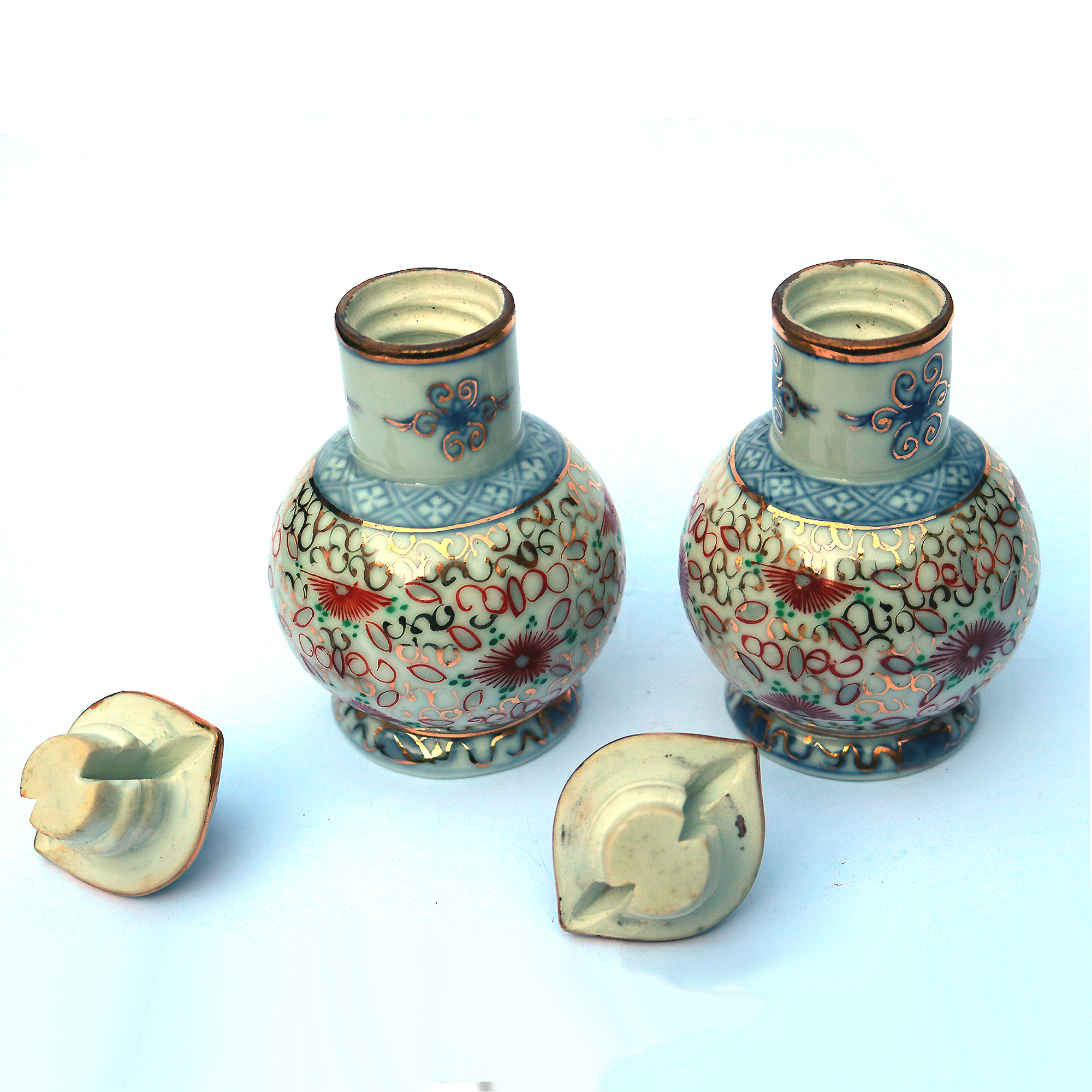 An unusual pair of porcelain Scent Perfume Bottle with screw caps C.20thC