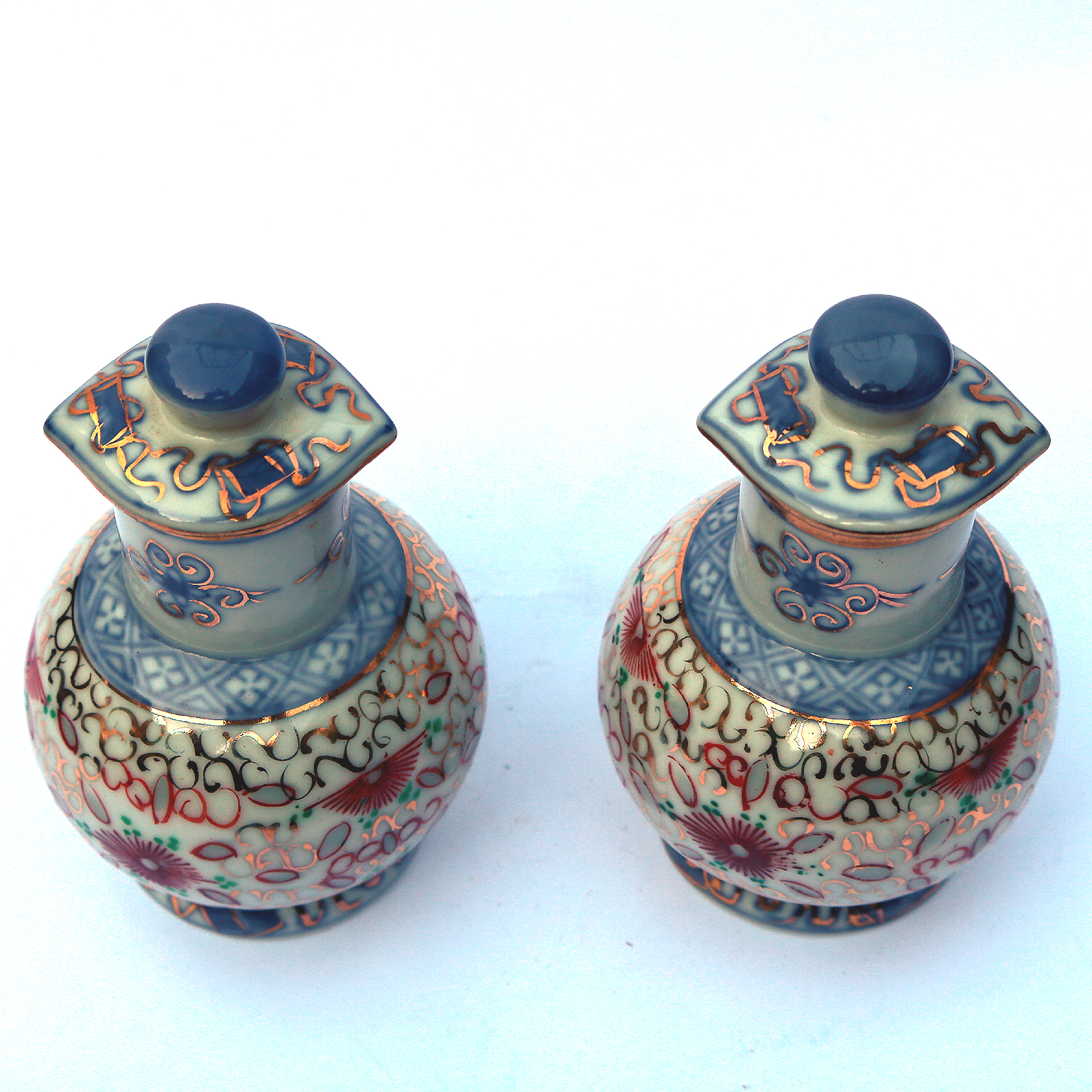 An unusual pair of porcelain Scent Perfume Bottle with screw caps C.20thC